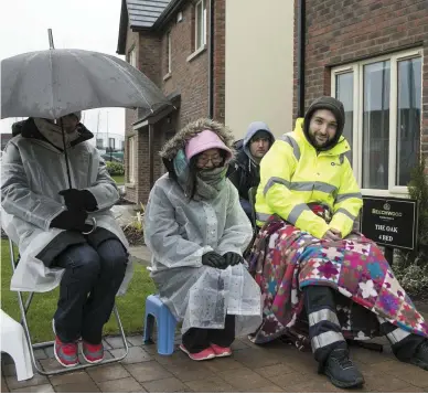  ?? Photo: Kyran O’Brien ?? Aspiring homebuyers queue for days to get a chance to buy new houses in Hansfield, west Dublin. From left: Judy Lay with her daughter Yvonne Mak, Dermot Smyth (back) and Martin Mooney.
