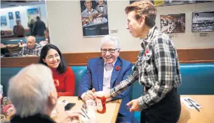  ?? COLE BURSTON TORONTO STAR ?? Mike Colle, centre, says the only way he keeps tabs on the goings on is by meeting with people.