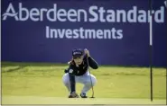  ?? KENNY SMITH — THE ASSOCIATED PRESS ?? Thailand’s Moriya Jutanugarn lines up her putt Saturday at the Ladies Scottish Open in North Berwick, Scotland.