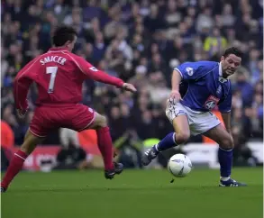  ?? PICTURE: Tim Easthope ?? Jerry Gill takes on Liverpool’s Vladimir Smicer