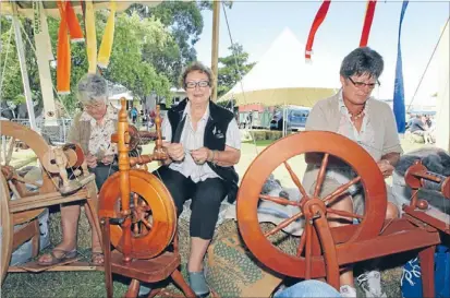  ??  ?? Preserving a craft: Lynda Carson, of Korere, left, Pat Lucas and Janet Moffitt, both of Tadmore Valley, all members of the Tapawera Spinners and Crafts Club, display their skill during Saturday’s show.