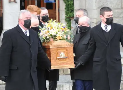  ?? Picture: Aidan Dullaghan/Newspics ?? The remains of the late Liam Reilly being carried from St. Joseph’s Redemptori­st Church following his funeral mass on Thursday morning.