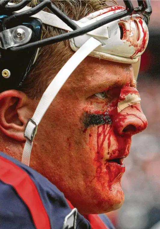  ?? Staff file photo ?? J.J. Watt's face during a home game against the Seattle Seahawks on Sept. 29, 2013, is an iconic memory that tells the story of his career in Houston.