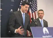  ?? J. Scott Applewhite / Associated Press ?? House Speaker Paul Ryan and Rep. Don Bacon discuss the budget blueprint with reporters.