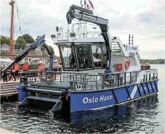  ?? Reuters ?? Cleanup boat:
A new electric zero-emission boat, named Pelikan II and designed specially for collecting rubbish in the sea is docked in the Port of Oslo. /