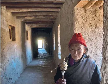  ??  ?? Older people from the region carry prayer sticks and keep chanting. This image was shot at Lamayaru Monastery, Ladakh