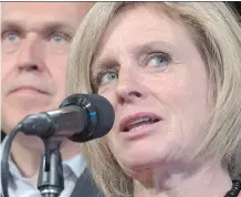  ?? THAN HAYWARD/ THE CANADIAN PRESS JONA- ?? Alberta Premier Rachel Notley discusses disaster relief and mitigation in Whitehorse on Friday as Yukon Premier Darrell Pasloski looks on.