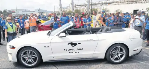  ?? AP ?? A 2019 GT Mustang, the 10 millionth Mustang built by Ford Motor Co, is displayed at the Flat Rock assembly plant in Michigan on Wednesday.