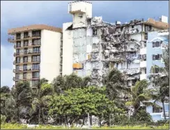  ?? PEDRO PORTAL/MIAMI HERALD ?? View of the Champlain Towers South Condo, located at 8777 Collins Ave. in Surfside, Florida, more than 24 hours after the building partially collapsed on June 24, 2021.