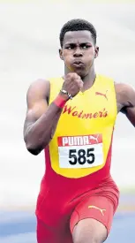  ?? PHOTOS BY RICARDO MAKYN/ CHIEF PHOTO EDITOR ?? Gary Card of Wolmer’s Boys wins the under-20 boys’ 200 metres final at the Carifta Trials yesterday at the National Stadium.