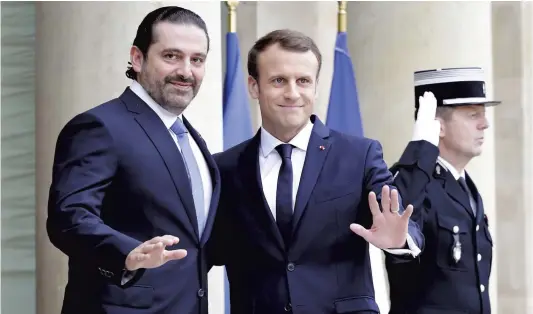  ?? PHOTO AFP ?? Le premier ministre libanais Saad Hariri a été accueilli à l’Élysée hier matin par le président français Emmanuel Macron.