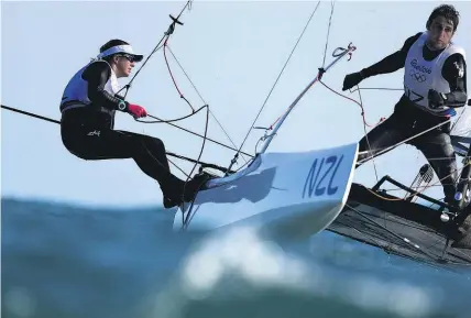  ?? Getty ?? Nacra 17 pair Jason Saunders and Gemma Jones are teaming up again for another crack at Olympic gold.