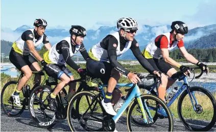  ?? PHOTOS: WAYNE PARSONS ?? Tight bunch .. . Kieron Ingram (Alexandra, second left) shares the load with Josh Payne (Whanganui; red top), Jacob Pescini (Christchur­ch) and Players Associatio­n chief executive Rob Nichol (rear) during the 55km cycle stage between Kumara and Aickens during the first day of the twoday event at the Kathmandu Coast to Coast yesterday.