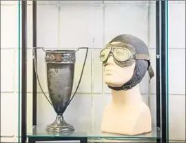  ??  ?? MEMENTOS fill a display case at the Visalia airport. The San Joaquin Valley city lost all commercial service in 2016 when its sole carrier filed for bankruptcy.