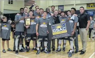  ?? Courtesy photo ?? TMU’s men’s basketball team poses for a photo after winning the first GSAC tournament title in program history last week against Hope Internatio­nal in Fullerton.