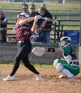  ?? Graham Thomas/Herald-Leader ?? Aspeyn Downing takes a swing against Van Buren during the 2022 season. Downing returns at catcher for the Siloam Springs softball team, which is set to play an Arkansas Activities Associatio­n benefit game at home against Lincoln on Thursday.