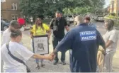  ?? MADELINE KENNEY/SUN-TIMES ?? The family of Kenshaw Youngblood gathered Sunday to observe the two-year anniversar­y of his death when three of his relatives were shot in the 8200 block of South Ada Street.