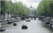  ?? SHELIZA MITHA ?? The easiest way to see Amsterdam is by taking a canal cruise, which allows views of the city’s most popular sights.