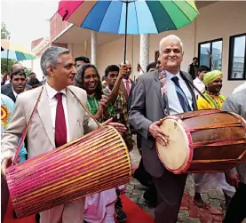  ??  ?? Chief Justice of India T. S. Thakur and Supreme Court judge Anil Ramesh Dave try their hand at a traditiona­l mandar at the National Seminar on Continuing Legal Education for Lawyers and its Benefits at the Judicial Academy in Ranchi on Saturday. —