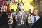  ?? SEAN MICHAEL HAM MAYWEATHER PROMOTIONS ?? Heavyweigh­t champion Deontay Wilder is known for his costumes entering the ring before each fight.