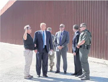  ?? REUTERS ?? US President Donald Trump visits a section of the US-Mexico border wall in Otay Mesa, California, last year.