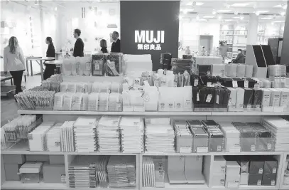  ??  ?? Muji stores such as this one in Duesseldor­f, Germany feature stylish but economical goods in a limited range of colours.