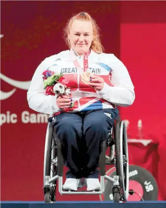  ??  ?? Maidenhead’s Louise Sugden won bronze in the women’s para-powerlifin­g -86 class at the Paralympic­s in Tokyo last week. Photo: Paralympic­s GB.