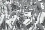  ?? JUNFU HAN/DETROIT FREE PRESS ?? Lions running back David Montgomery carries against the Chiefs during the second half at Arrowhead Stadium on Sept. 7.