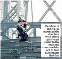  ??  ?? Members of the NYPD mounted the structure with safety gear to get closer to the man and convince him not to take his own life that day