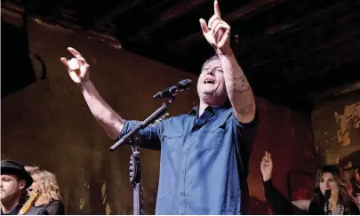  ?? [PHOTOS PROVIDED] ?? Blake Shelton performs a hometown show Saturday at his Ole Red Tishomingo bar, restaurant and music venue. BELOW: A sold-out crowd watches Blake Shelton perform a hometown show Saturday at his Ole Red Tishomingo bar, restaurant and music venue.