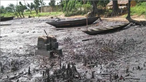  ??  ?? Scene of environmen­tal pollution in Ogoniland