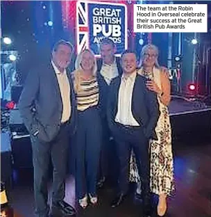  ?? ?? The team at the Robin Hood in Overseal celebrate their success at the Great British Pub Awards