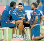  ?? AFP ?? Captain Rohit Sharma and Mahela Jayawarden­e (right) need to take a tough call regarding Kieron Pollard (left).