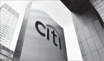  ?? Justin Lane European Pressphoto Agency ?? THE JUSTICE Department had contended that a lack of internal controls at Citibank’s Banamex subsidiary may have allowed customers to launder money sent to Mexico. Above, Citigroup’s logo at its New York offices.