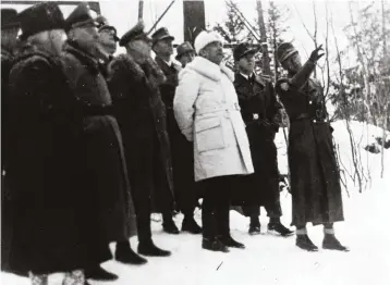  ??  ?? Josef Terboven, Reichskomm­issar for Norway (far right) and General von Falkenhors­t (white coat) assess the damage done to the Vemork plant in the wake of the SOE attack