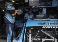  ?? COLIN E. BRALEY - THE ASSOCIATED PRESS ?? Kevin Harvick takes off his helmet after qualifying for the NASCAR Cup Series auto race at Kansas Speedway in Kansas City, Kan., Friday, May 10, 2019. Harvick won the pole.