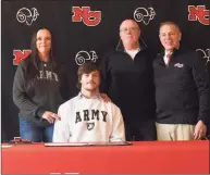  ?? Dave Stewart / Hearst Connecticu­t Media ?? New Canaan’s Ned Brady with, from left, mom Sandra Brady, dad Sean Brady, and football coach Lou Marinelli after signing his National Letter of Intent to play football for Army during a ceremony in New Canaan’s Waveny House on Wednesday.