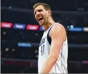  ?? HARRY HOW/GETTY IMAGES ?? Nowitzki has not said whether he would retire after this season or come back for one more. Even after all his accomplish­ments, he seems content helping with the Dallas franchise’s rebuilding.