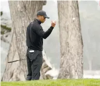  ?? /AP ?? PRACTICE. Tiger Woods tosses a ball down on the 17th hole during a practice round for the PGA Championsh­ip golf tournament at TPC Harding Park Wednesday, Aug. 5, 2020, in San Francisco.