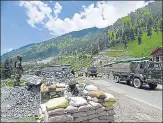  ?? WASEEM ANDRABI/HT PHOTO ?? ■
An Army convoy on its way to Ladakh, June 18.