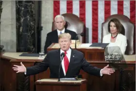  ?? ANDREW HARNIK — THE ASSOCIATED PRESS FILE ?? In this file photo, President Donald Trump delivers his State of the Union address to a joint session of Congress on Capitol Hill in Washington, as Vice President Mike Pence and Speaker of the House Nancy Pelosi, D-Calif., watch.