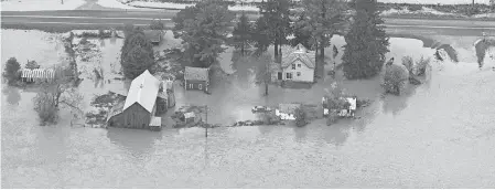  ?? MARK HOFFMAN/USA TODAY NETWORK ?? Floodwater­s inundate a farm Aug. 28 in Vernon County, Wis., about 90 miles northwest of the capital, Madison.