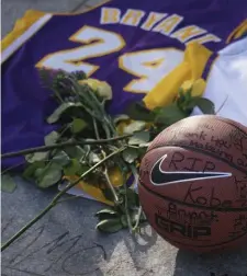  ?? GETTY IMAGES ?? FITTING TRIBUTE: A memorial for Kobe Bryant near Staples Center on Monday in Los Angeles.