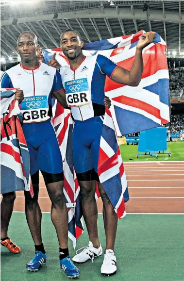  ??  ?? Glory day: (from left to right) Mark Lewis-francis, Jason Gardener, Marlon Devonish and Darren Campbell celebrate their 4x100m victory in Athens in 2004