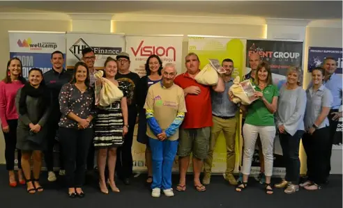  ??  ?? GENEROUS: Excited about the handover of nearly $30,000 to local charities from Peak2Park are (from left) DC Advisory’s Taahlea Mogg and Latoya Kenealy, Vision’s Adam King, Toowoomba Clubhouse’s Ruth Phillips, Peak2Park president Troy Morgan, Cystic Fibrosis Queensland’s Connie Arundel, Toowoomba Clubhouse’s Shane Smith, Deborah Bailey, Stephen Wooldridge and Dan Bennett, Hear and Say’s Jim Green, Willows’ Craig Neilan, Hear and Say’s Anna Warby, Peak2Park’s Sue Morgan and Chelsea Fien, and THL Finance Partners’ Peter Morris. Photo: Contribute­d