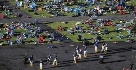  ?? FOTO: DPA ?? Beamte des FBI suchen auf dem verwüstete­n Festivalge­lände nach Spuren des Massakers.