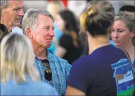  ?? Mark J. Terrill Associated Press ?? GLEN FRITZLER, owner of Truth Aquatics, attends a vigil in Santa Barbara for the 34 people killed in a Labor Day fire on one of his dive boats, the Conception.