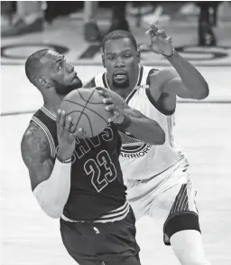  ?? CARY EDMONDSON/USA TODAY SPORTS ?? After the Cavaliers had fallen to the Warriors 113-91 on Thursday, LeBron James was asked why Golden State had been so good. His answer was simple: “K.D.” Kevin Durant, rear, finished with 38 points, eight rebounds and eight assists.