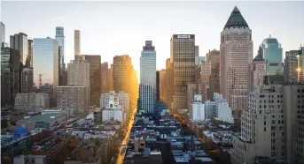  ?? Ben O’Bro, Unsplash photo ?? The towers of midtown Manhattan, “the most coveted real estate in the world,” as Sarah Goldfeder writes, symbol of one of two Americas, the “haves” not struggling with the economic disaster pandemic as are the “have-nots”, usually people of colour.