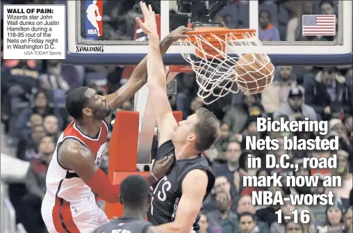  ?? USA TODAY Sports ?? WALL OF PAIN: Wizards star John Wall dunks on Justin Hamilton during a 118-95 rout of the Nets on Friday night in Washington D.C.